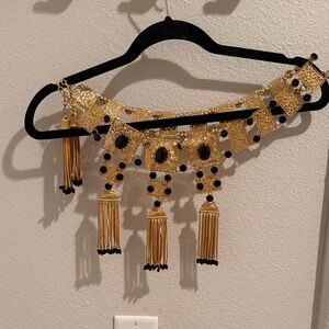 Elegant Gold and Black Tassel Belt